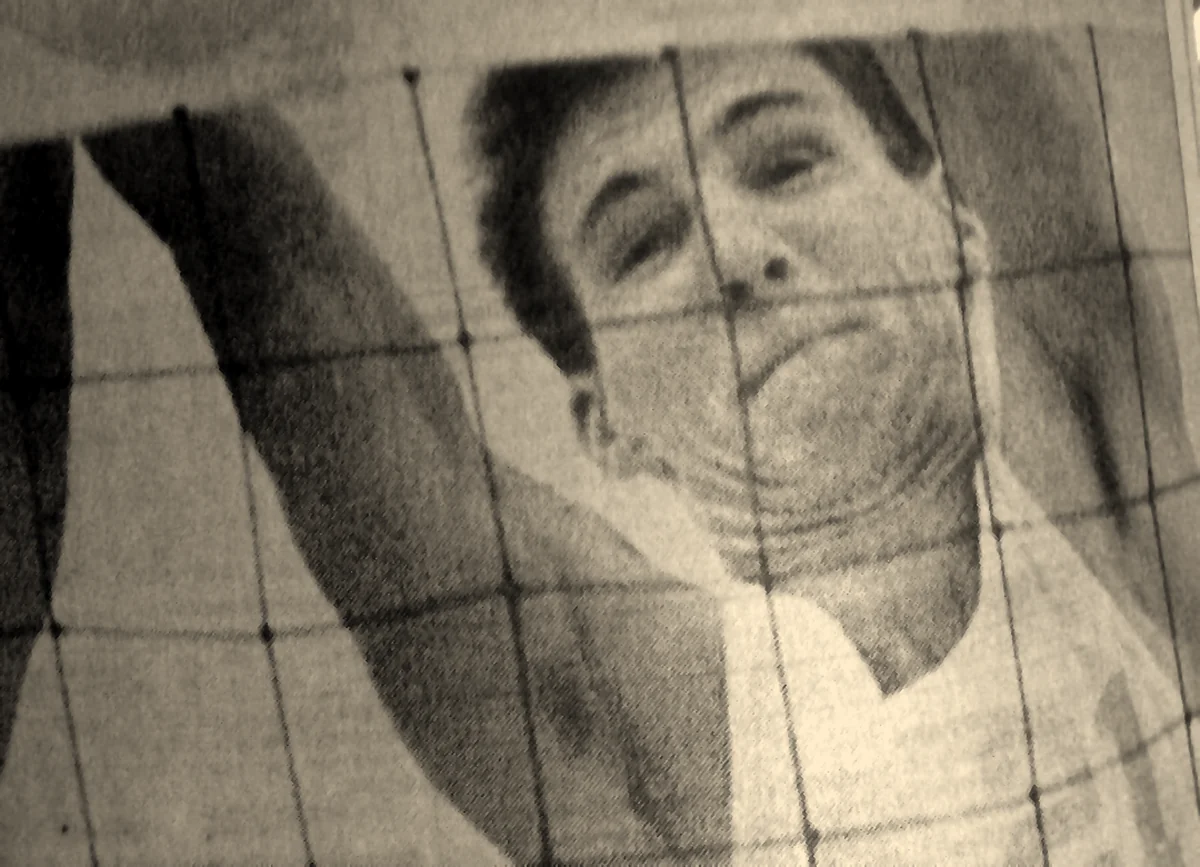 Close-up of Mike Millett at the net, from the same newspaper photo